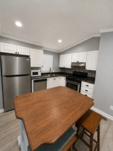 Space #53 -$119,900 – 2 Bed, 1 Bath – Open Concept Home with Fireplace & Covered Deck